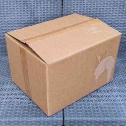 Clean medium size cardboard box with foam peanuts for shipping moving or storage