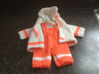 Hand knitted doll outfit