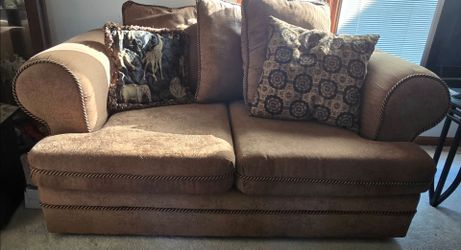 Brown Loveseat with Rope Trim