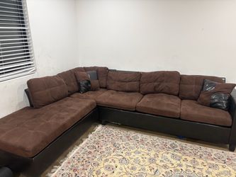 L-Shaped brown couch