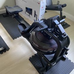 Sunny Health & Fitness Obsidian Surge Water Rower Machine