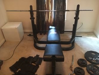 Body by jake bench with curl bar and weights