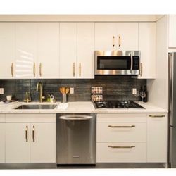 Beautiful white acrylic custom made kitchen cabinets island and pantry Cabinets can be rearranged to different configurations