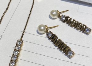 Photo Dior 2019 J’a Dior earrings crystal gold dangle