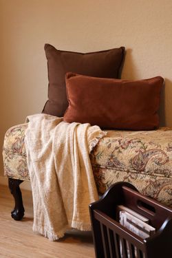 Vintage Claw Foot Upholstered Ottoman