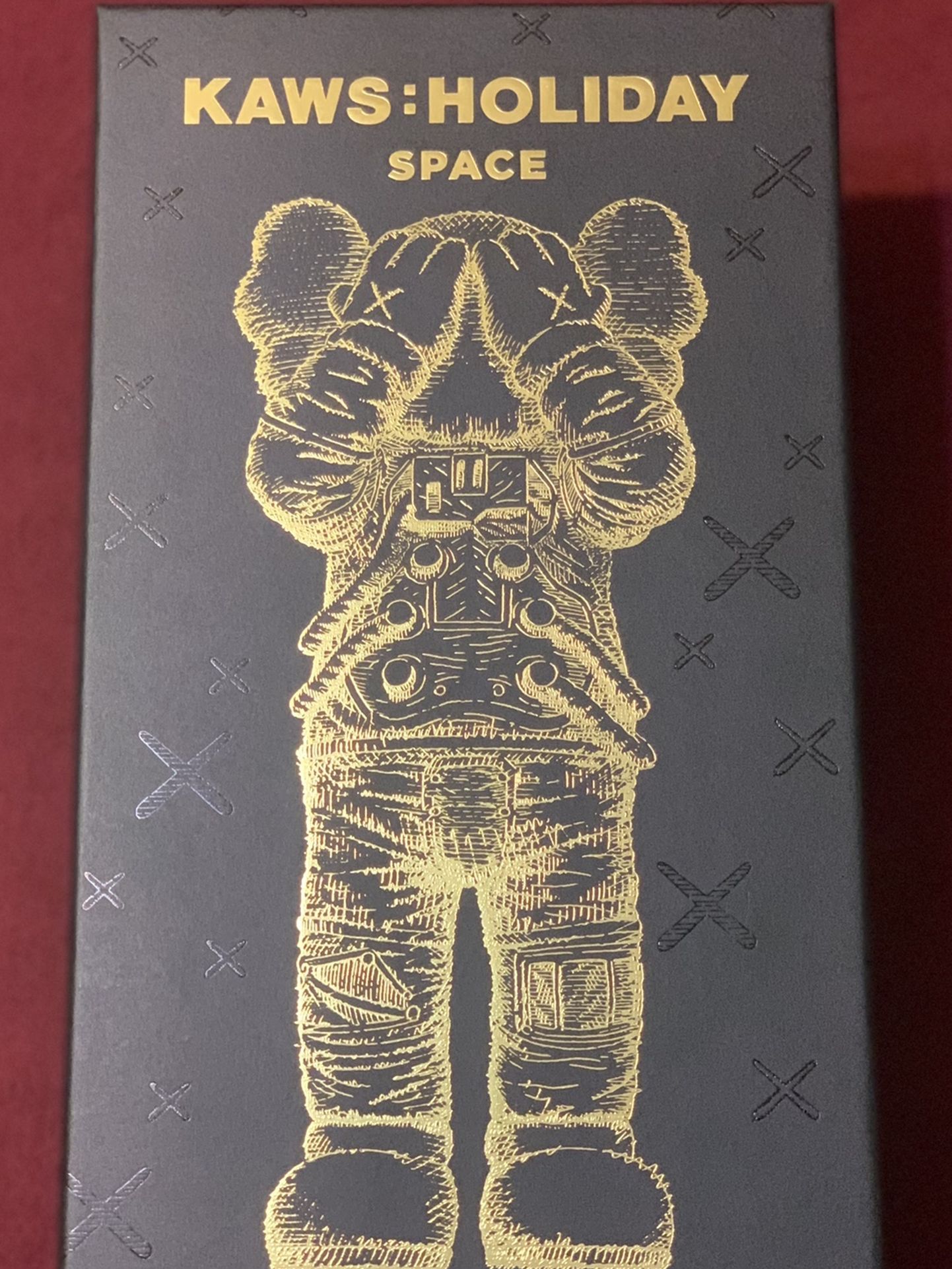 Kaws space holiday figure gold