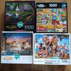 Four 1000 Piece Puzzles