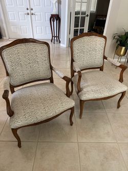 Paired Arm Chairs