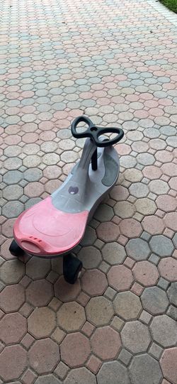 Wiggle car- ride on zig zag toy