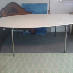 white oval dining table