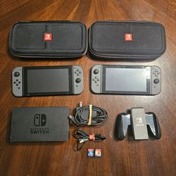 2 Nintendo switches bundle with charger + games + accessories.