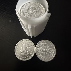 Silver Aztec calendar coin