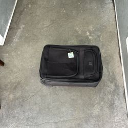 Small suitcase, all zippers work and rolls