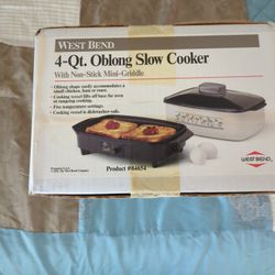 4 Quart Oblong Slow Cooker  Asking 20.00 OBO