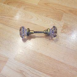 Vintage glass doorknobs .