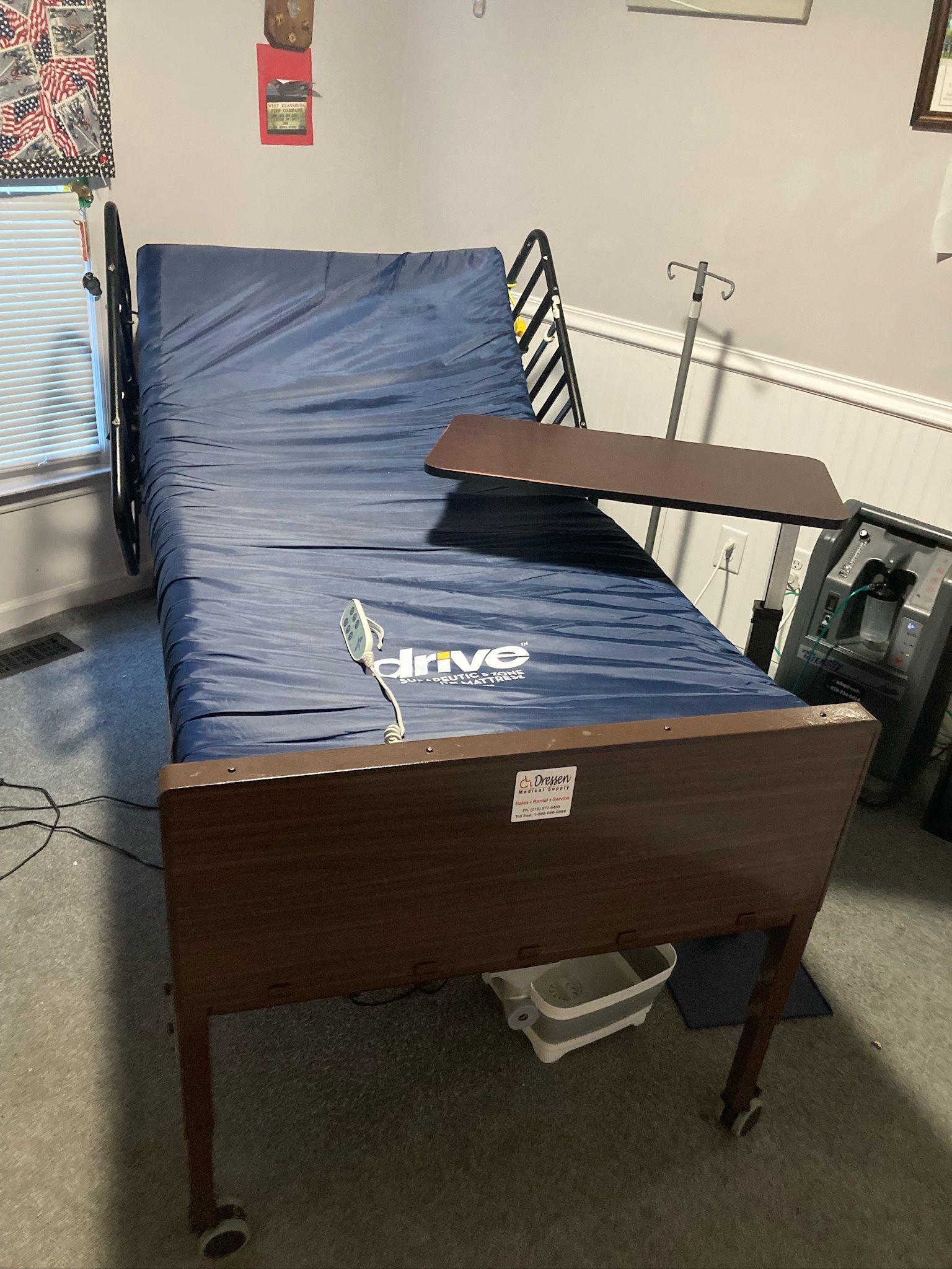 Electric hospital bed and adjustable hospital side table.