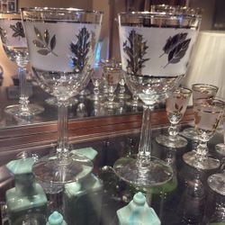 Two wine glasses, trimmed in silver