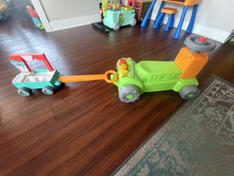 Fisher-Price Laugh & Learn 4-in-1 Farm to Market Tractor Ride-On