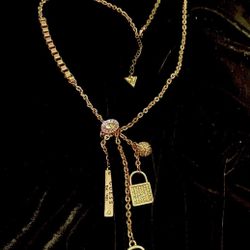 Guess Gold-Tone Pave Crystal & Logo Multi-Charm Pendant Necklace, 36” + 2” Extension 