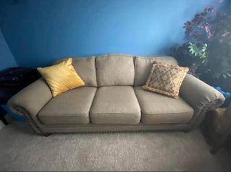 Weir’s sofa with nail head trim
