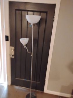 Stand up lamp with a side like that can be moved around.