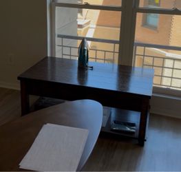 Brown coffee table with roller