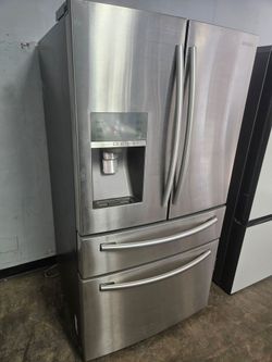 samsung four doors stainless steel refrigerator.