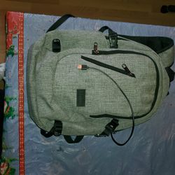 NEW CONDITION MANCRO MULTI POCKETED BACKPACK WITH USB CHARGER. 