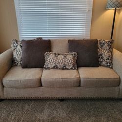 Comfortable, Ashley Sofa and Chair Set.