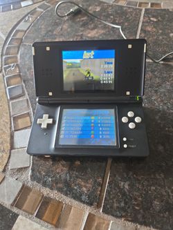 Nintendo DS lite Handheld with charger  n one game