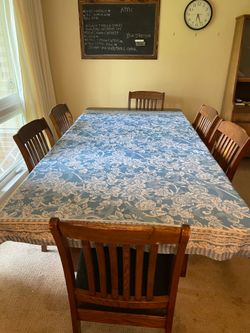 Table and 6 chairs.