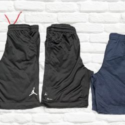 BUNDLE OF 3 SHORTS.1 NIKE NAVY BLUE. 2 NIKE  AIR  BLACK SHORTS. SIZE 7.