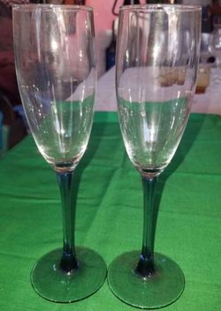 2 crystal champagne flutes with blue stem and base 8.75 inches tall A38V986