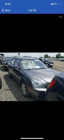 Kia Optima , 4 Cyl - stick shift trans - 136,000 miles- needs clutch- runs