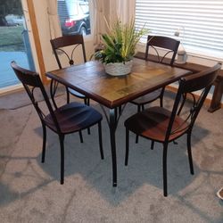 Table And 4 Chairs 
