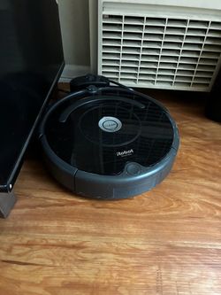iRobot Roomba Robot Vacuum with Charging Dock - Works Great