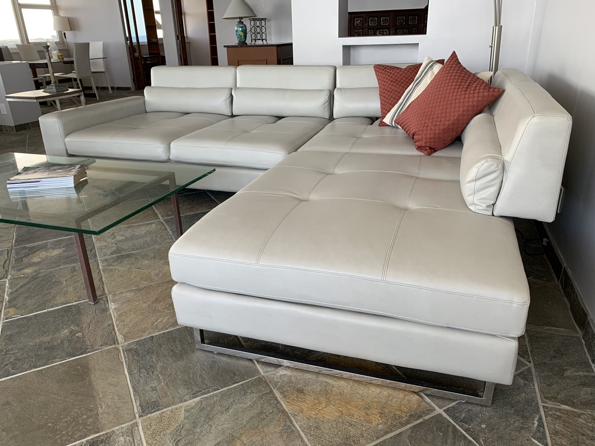 Large modern leather style sectional with adjustable back rests