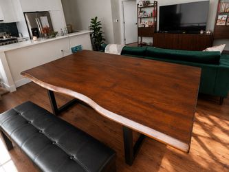 Live edge solid wood dining table with metal base