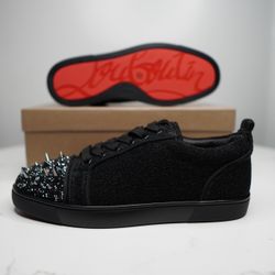 Christian Louboutin (Red Bottoms) 