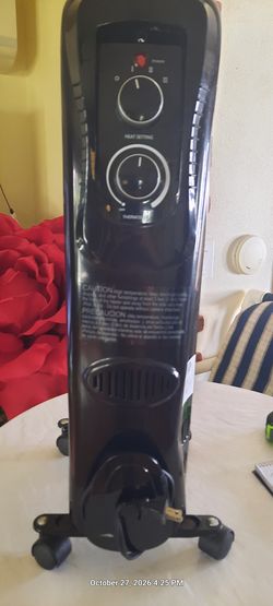 Two portable electric space heaters on wheels for sale - $50 (OCOEE)