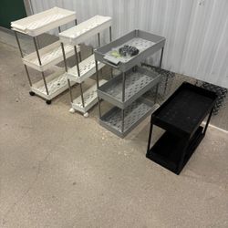 Four storages shelving on wheels .. $40