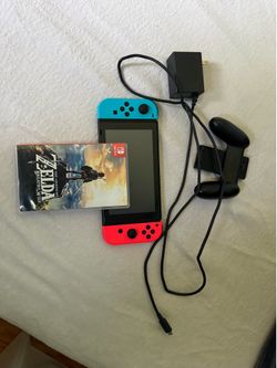 Nintendo Switch w/ Legend of Zelda game