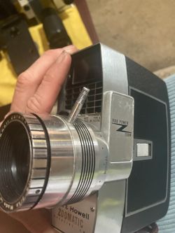 Eastman Kodak camera and vintage bell and Howell movie camera with projector