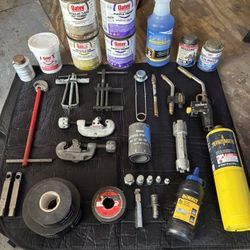 Plumbers Assorted Tools and Supplies