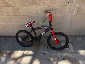 Dynacraft surge red and black bike