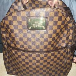 Louis Vuitton Discovery Bookbag