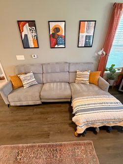 Gray 3-Piece Sectional with Recliner and Built-in Outlet