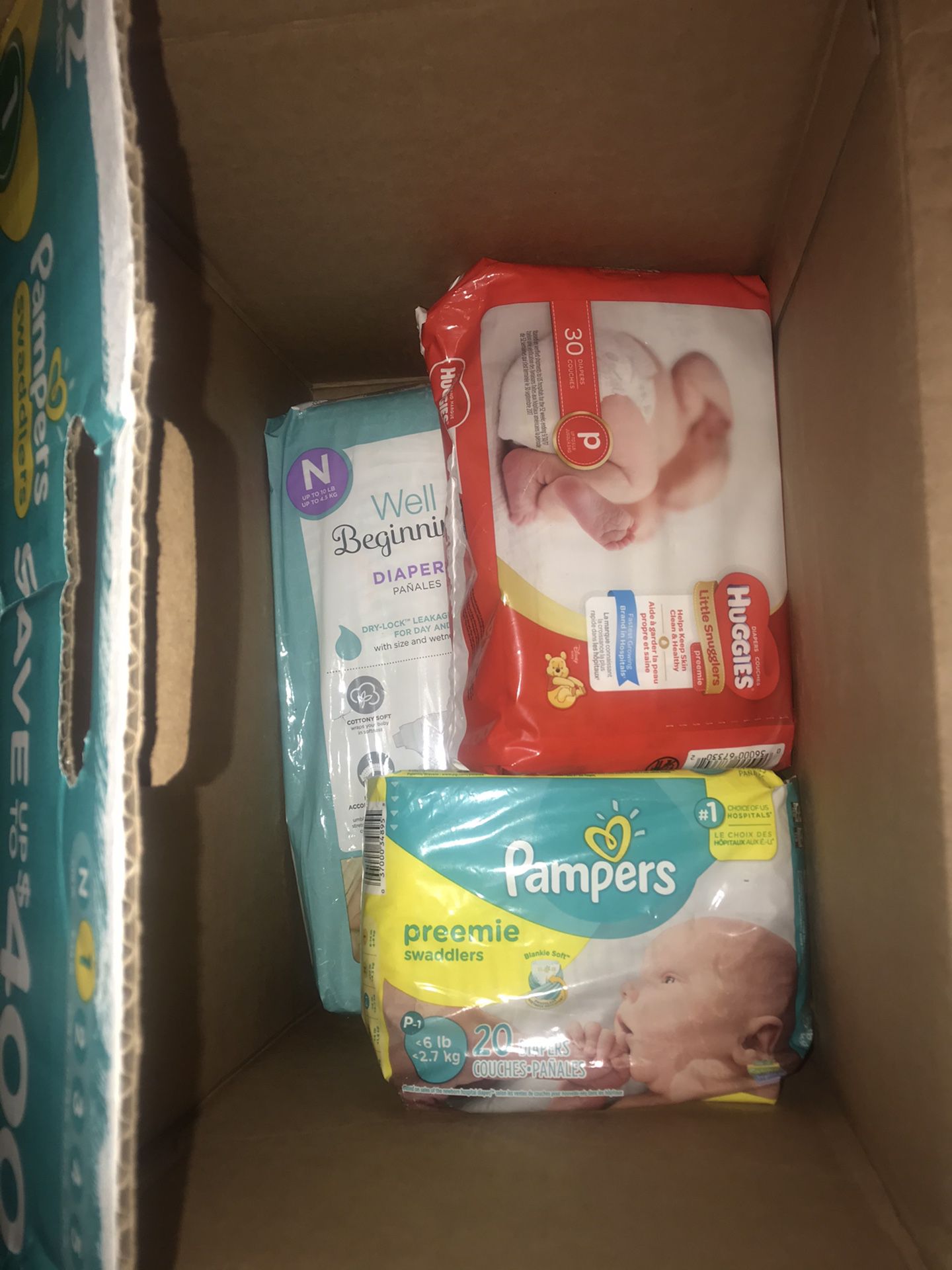 1 pack of newborn 2 packs of Preemie diapers