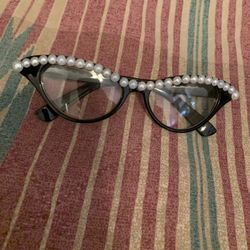 Black costume jewelry glasses with faux pearls (La Jolla Boutique)