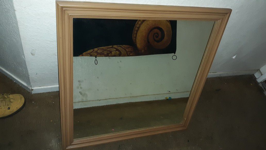 Heavy mirror in wooden frame